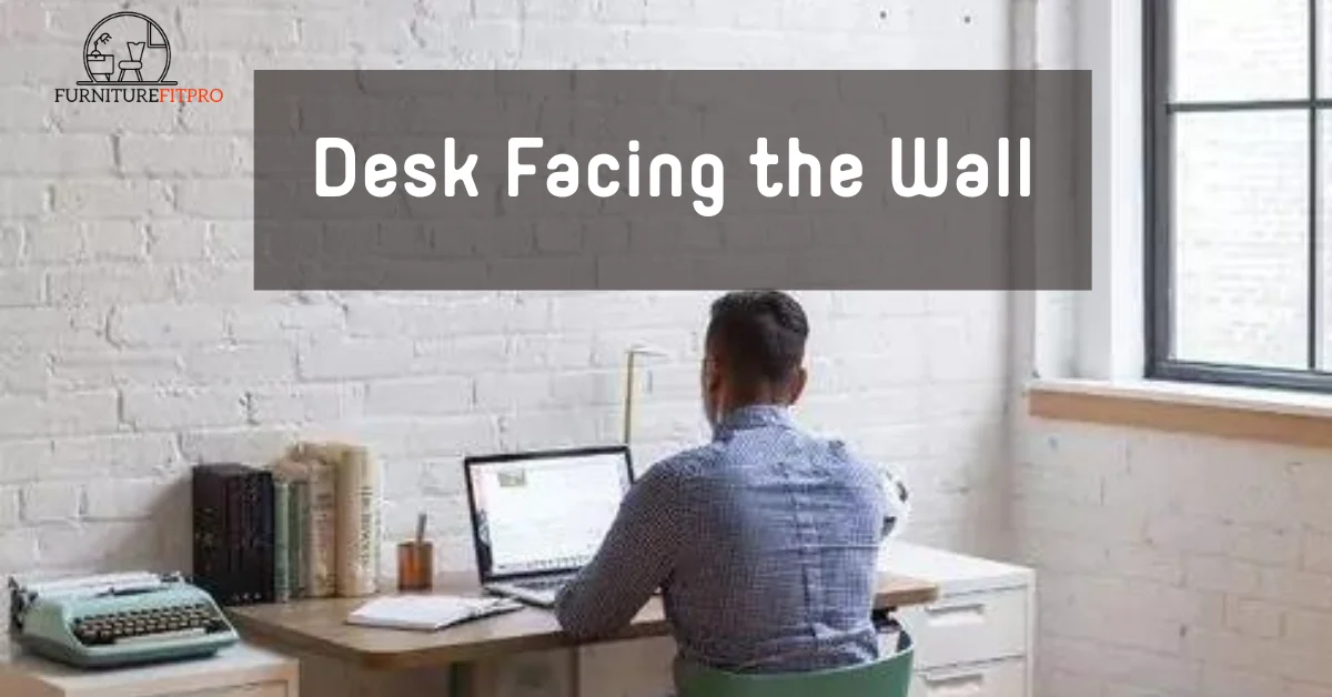 Desk facing the wall